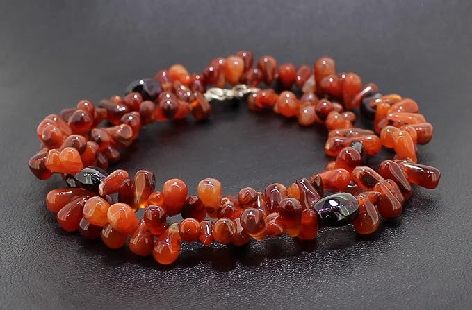 karneol granat Stein Trommelstein Hals Schmuck Anhänger Edelstein Heilstein Rohstein Rohstück Glücksstein Schutzstein Lochstein Naturstein Amulett Deko Handstein Handschmeichler Kugel Ohrringe Ohrstecker Armband