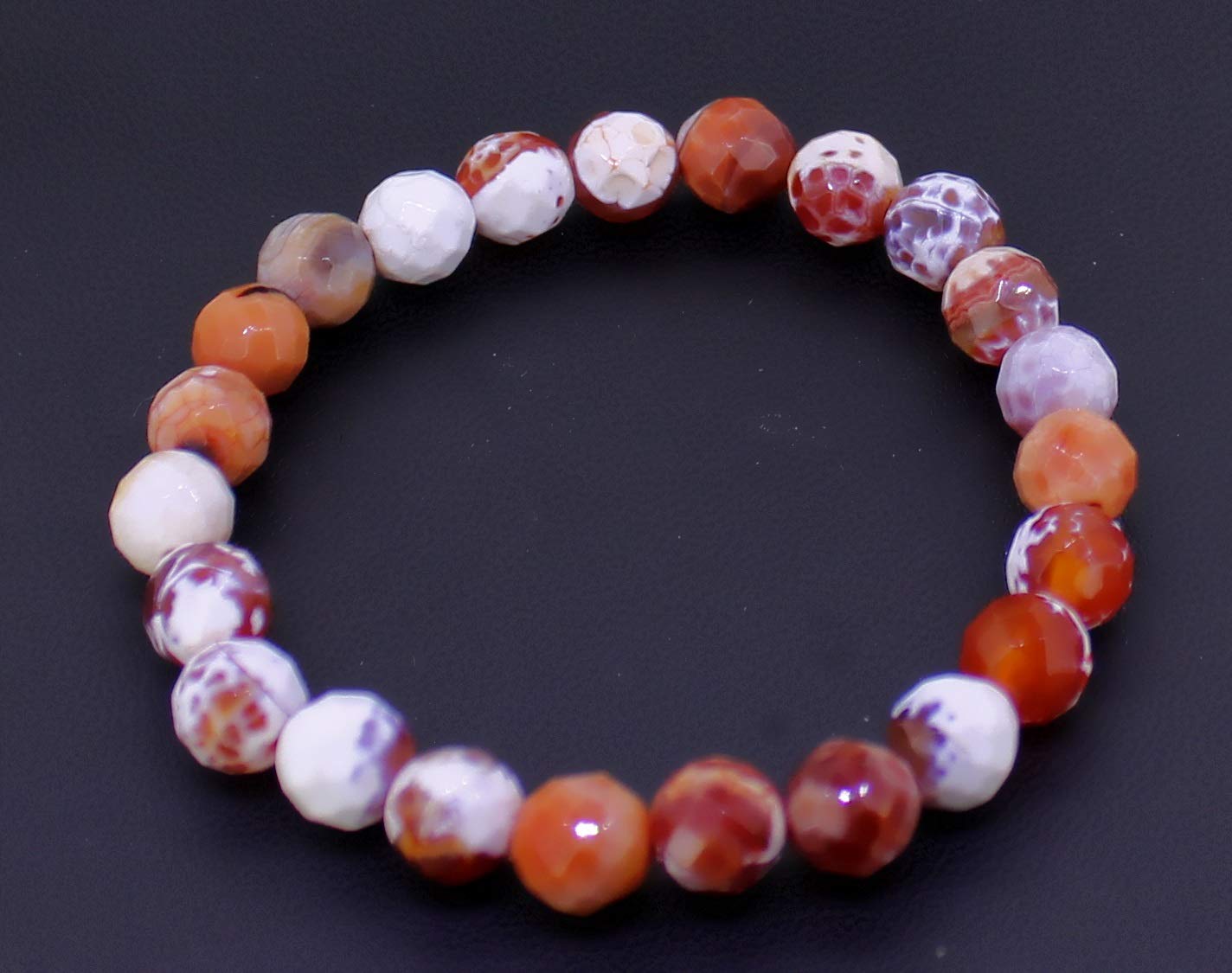 Armband aus Feuerachat Stein Trommelstein Anhänger Perlen Kugeln Heilstein Edelstein Kugelarmband Perlenarmband Edelsteinarmband Stretcharmband Gummiarmband Armschmuck Schmuckstein Rohstein Rohstück Schmuck