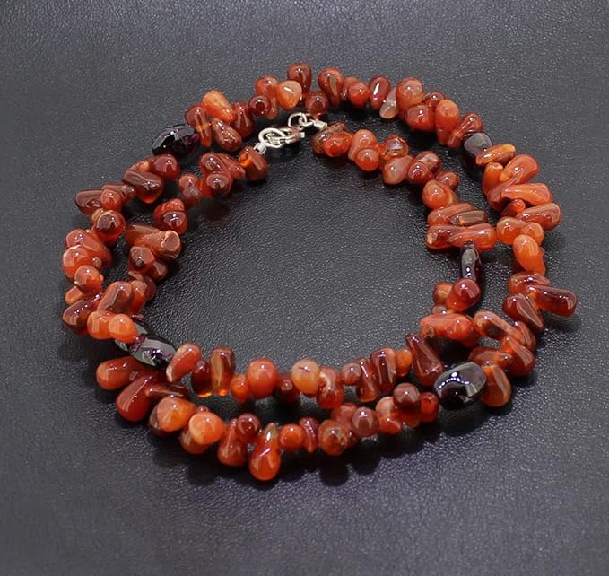 karneol granat Stein Trommelstein Hals Schmuck Anhänger Edelstein Heilstein Rohstein Rohstück Glücksstein Schutzstein Lochstein Naturstein Amulett Deko Handstein Handschmeichler Kugel Ohrringe Ohrstecker Armband