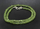 peridot olivin Stein Trommelstein Hals Schmuck Anhänger Edelstein Heilstein Rohstein Rohstück Glücksstein Schutzstein Lochstein Naturstein Amulett Deko Handstein Handschmeichler Kugel Ohrringe Ohrstecker Armband