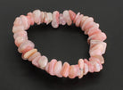 Armband aus Andenopal rosa Andenopal Stein Trommelstein Anhänger Perlen Nuggets Heilstein Edelstein Nuggetsarmband Perlenarmband Edelsteinarmband Stretcharmband Gummiarmband Armschmuck Schmuckstein Rohstein Rohstück Schmuck Kettenanhänger