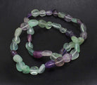 Halskettenanhänger Kettenanhänger Anhänger Regenbogenfluorit grüner blauer Fluorit grün blau Stein Rohstein Rohstück Schmuckanhänger Donut Edelsteindonut Edelstein Heilstein Rohstein Rohstück Fluoritanhänger Fluoritstein Fluoritschmuck