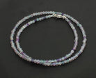 Halskette Kette aus Regenbogenfluorit Fluorit Stein Trommelstein Anhänger Trommelsteinanhänger Perlenkette Kugelkette Collier Buttonkette Edelstein Heilstein Halsschmuck Schmuck Schmuckstein Schmuckkette Schmuckcollier Fluoritstein Fluoritkette