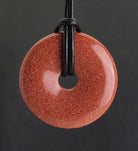 Halskettenanhänger Kettenanhänger Kettenschmuck Goldfluß Goldfluss Stein Trommelstein Anhänger Donut Edelsteindonut Heilsteindonut Halsschmuck Schmuckstein Rohstein Rohstück Schmuckanhänger Silberanhänger Silberschmuck Donutanhänger