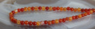 Halskette Kette aus Karneol Carneol Stein Trommelstein Anhänger Trommelsteinanhänger Perlenkette Kugelkette Collier Buttonkette Edelstein Heilstein Halsschmuck Schmuck Schmuckstein Schmuckkette Schmuckcollier Karneolstein Karneolkette