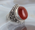 Carneol Karneol Stein Trommelstein Fingerschmuck Damenring Edelstein Edelsteinschmuck Edelsteinring Schmuckstein Schmuck Kettenanhänger Heilstein Silberschmuck Rohstein Rohstück Schmuckring Damenringe Silberringe Fingerringe Karneolstein Karneolschmuck Karneolring