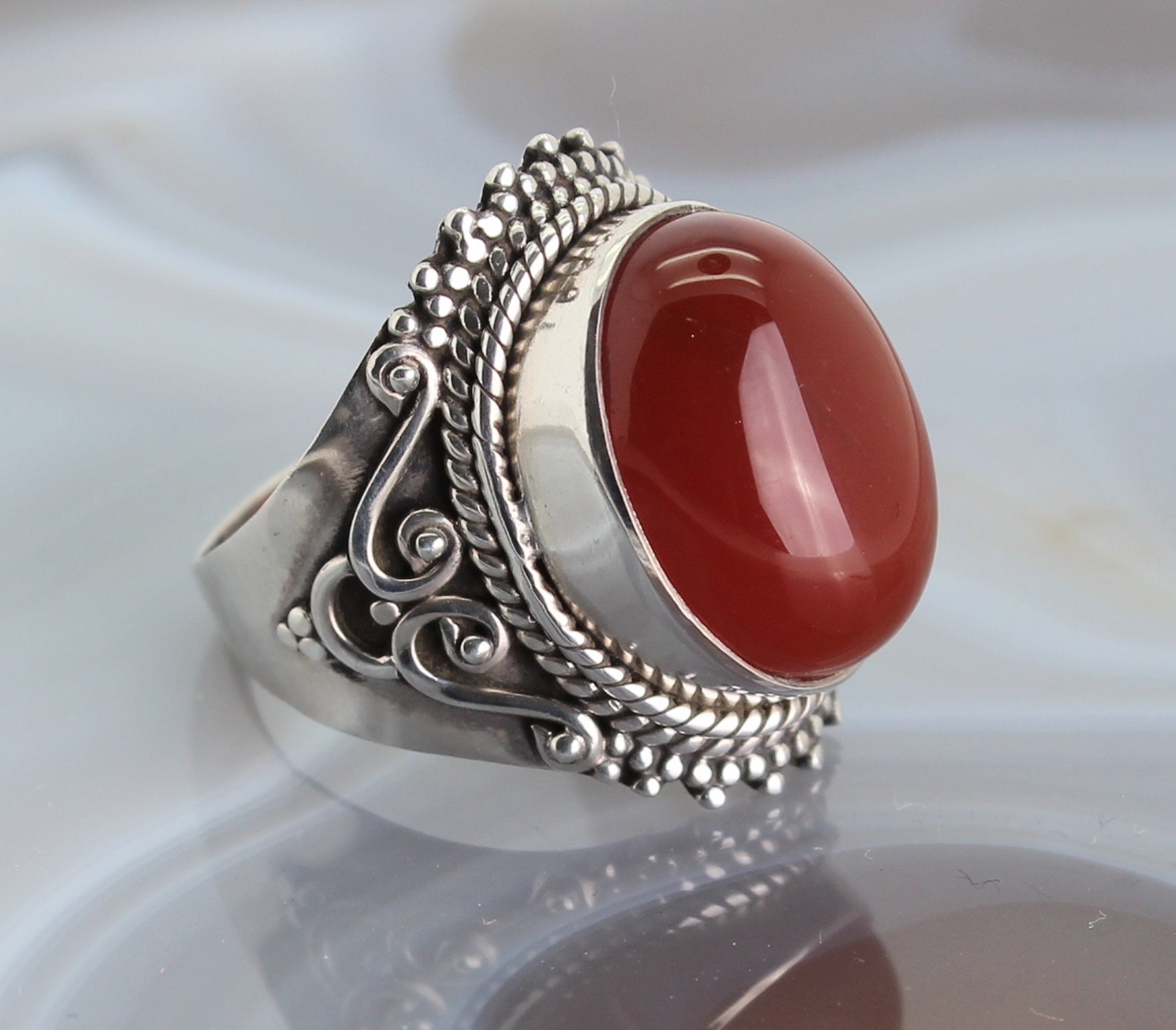 Carneol Karneol Stein Trommelstein Fingerschmuck Damenring Edelstein Edelsteinschmuck Edelsteinring Schmuckstein Schmuck Kettenanhänger Heilstein Silberschmuck Rohstein Rohstück Schmuckring Damenringe Silberringe Fingerringe Karneolstein Karneolschmuck Karneolring