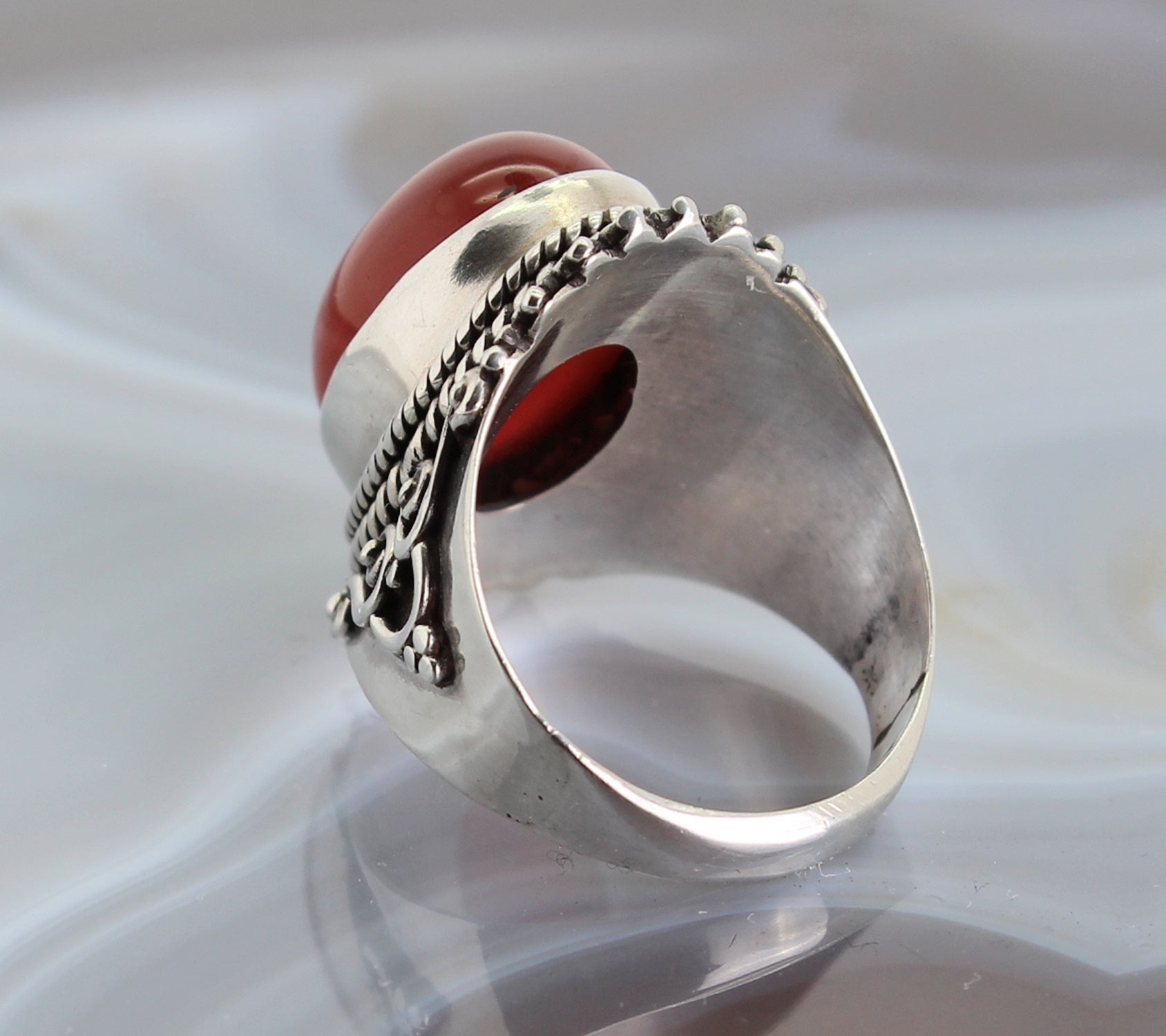 Carneol Karneol Stein Trommelstein Fingerschmuck Damenring Edelstein Edelsteinschmuck Edelsteinring Schmuckstein Schmuck Kettenanhänger Heilstein Silberschmuck Rohstein Rohstück Schmuckring Damenringe Silberringe Fingerringe Karneolstein Karneolschmuck Karneolring