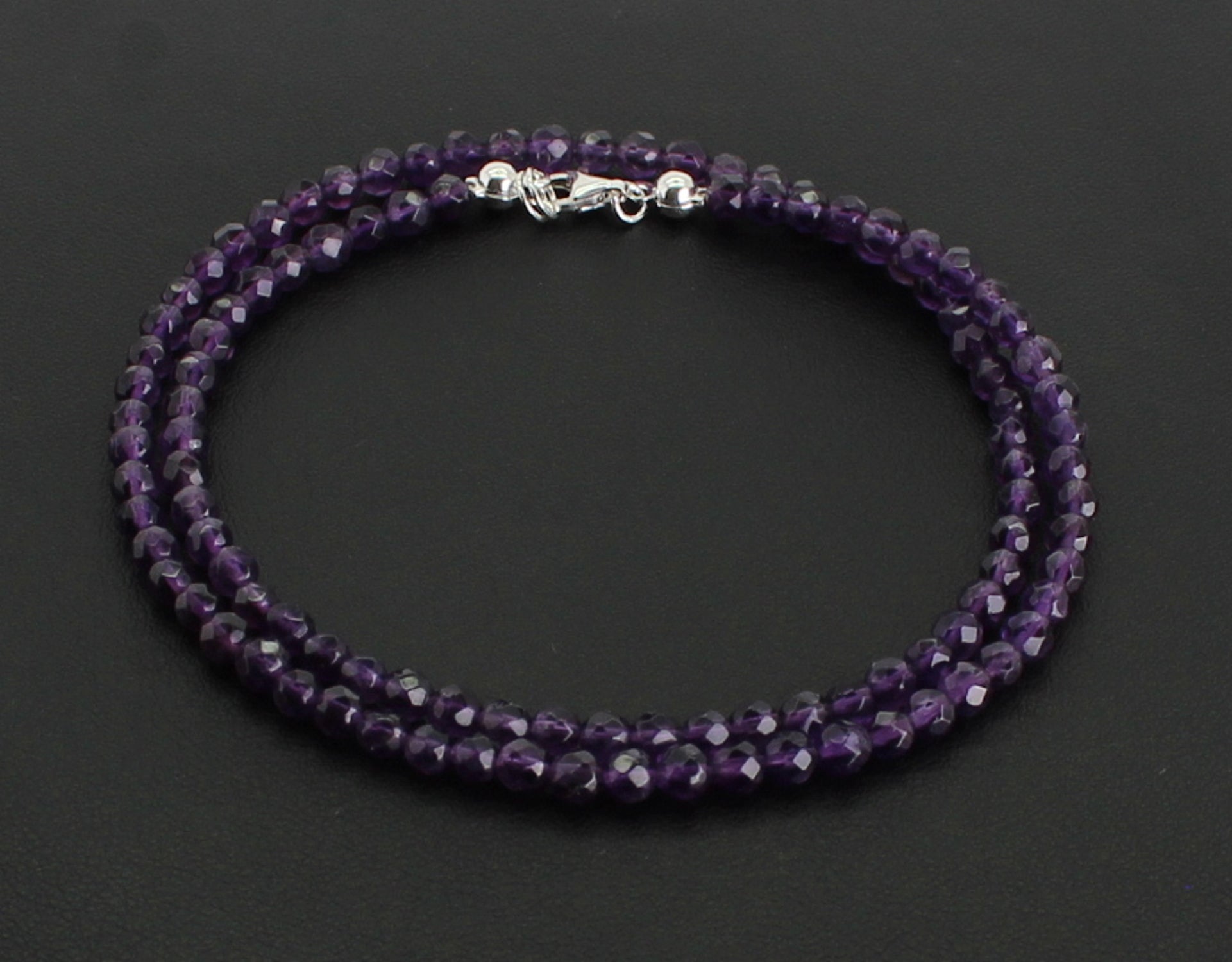 Stein Trommelstein Kugelkette Buttonkette Collier Halsschmuck Kettenschmuck Edelstein Heilstein Edelsteinkette Heilsteinkette Schmuck Rohstein Rohstück Schutzstein Glücksstein Amethyststein Amethystschmuck