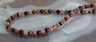 rosa grüner blauer Turmalin Stein Trommelstein Perlenkette Kugelkette Kette Halskette Buttonkette Collier Halsschmuck Kettenschmuck Edelstein Heilstein Edelsteinkette Heilsteinkette Schmuck Rohstein Rohstück rosa grüne blaue Turmalinkette Turmalinschmuck Turmalinstein